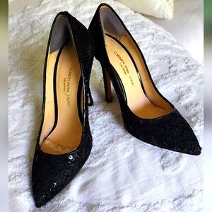 Sequence Carmen Marc Valvo black pumps.